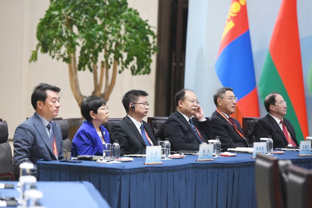 Attendees listen to speeches during the conference.